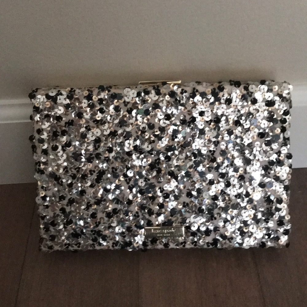 NWT all that glitters Kate spade clutch.